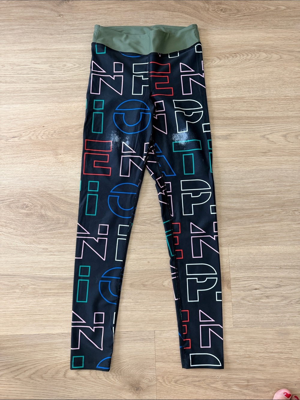 PE NATION XS Women’s Black Graphic Leggings with Olive Waistband